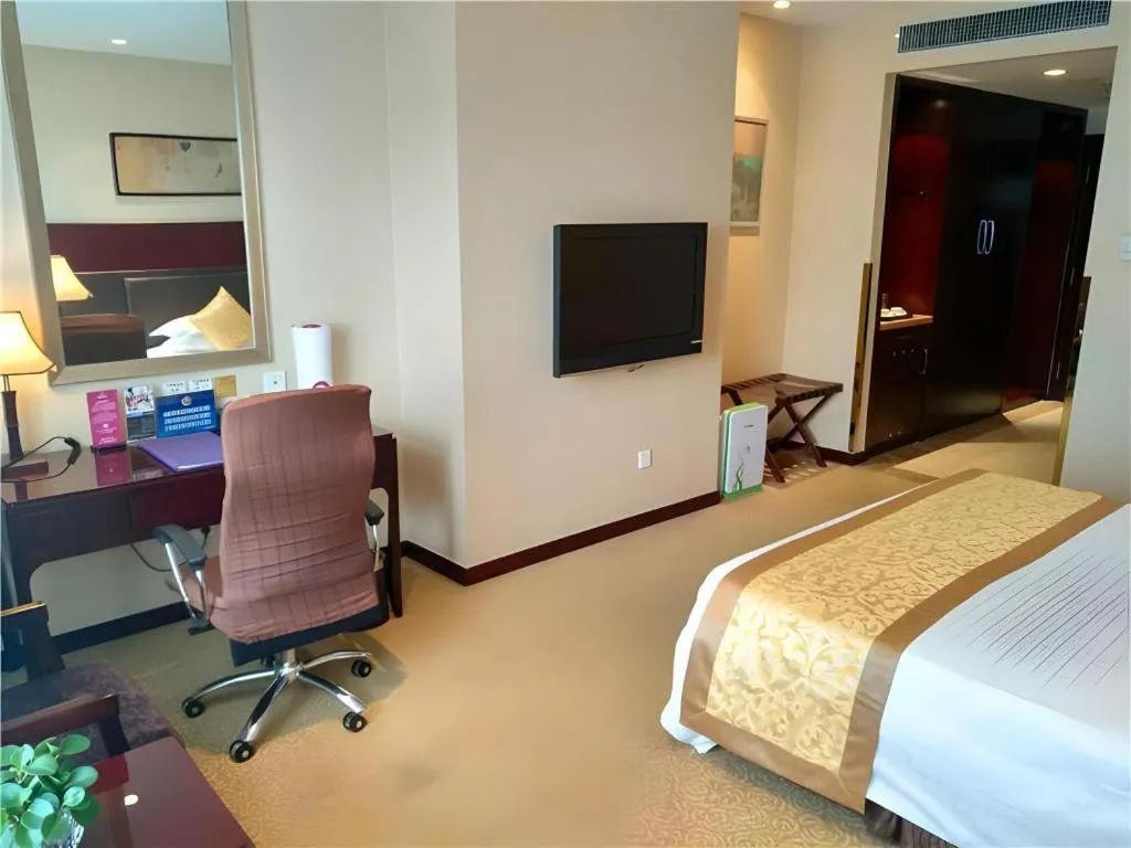 Bed in Zhong Yi Peng Ao Hotel