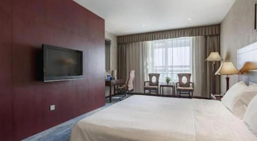 Bed in Zhong Yi Peng Ao Hotel