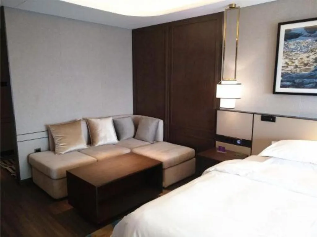 Bed in Zhong Yi Peng Ao Hotel