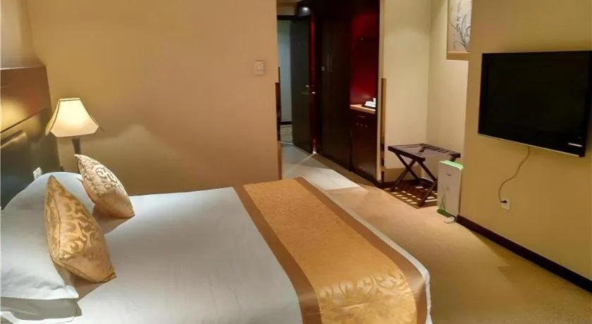 Bed in Zhong Yi Peng Ao Hotel