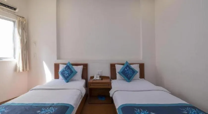 Bed in Blue River Hotel