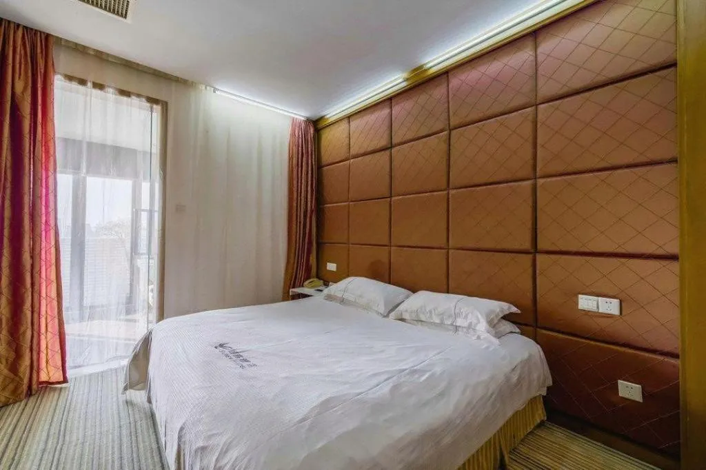 Bed in Silver Art Hotel