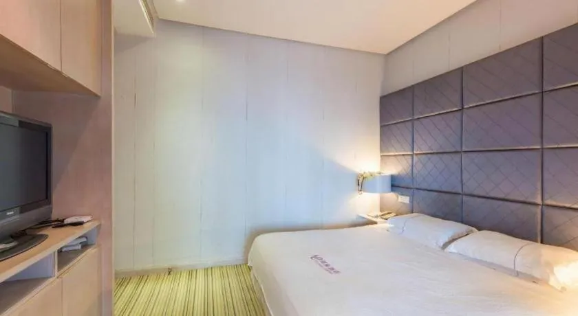 Bed in Silver Art Hotel