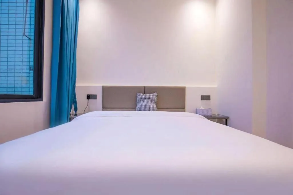 Bed in Silver Art Hotel