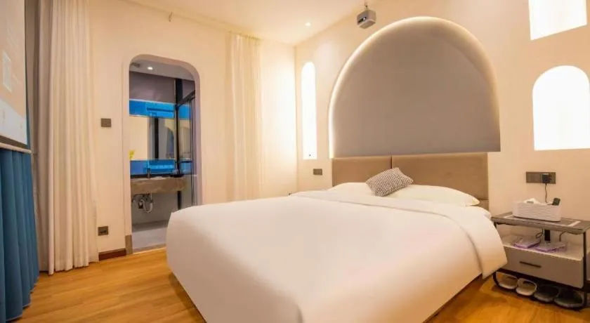 Bed in Silver Art Hotel