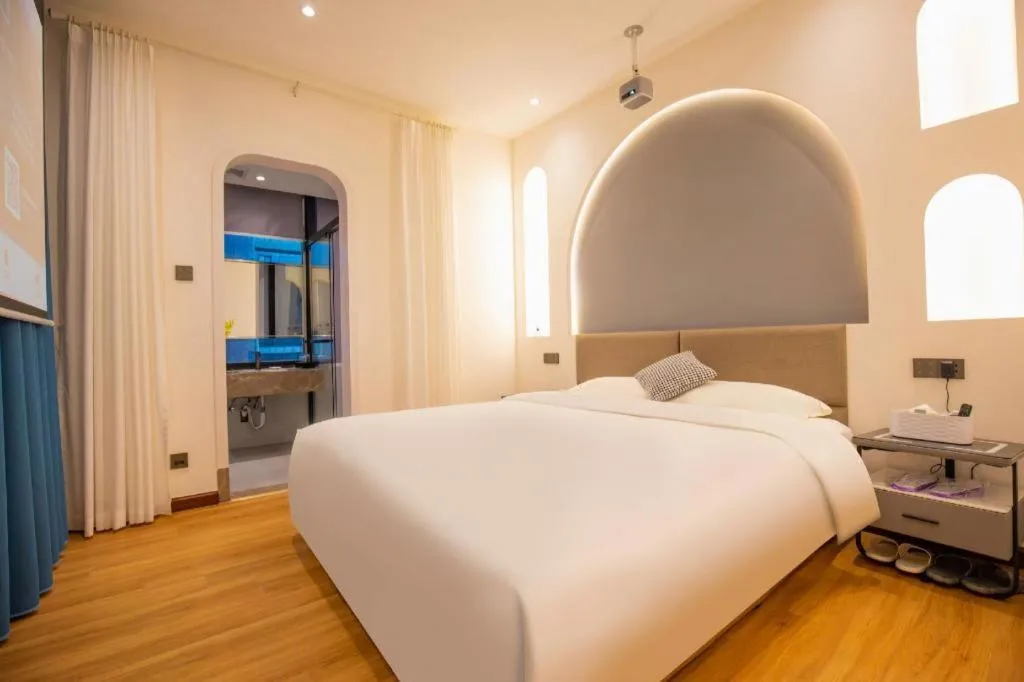 Bed in Silver Art Hotel