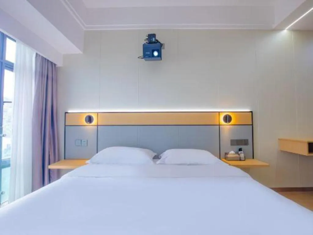 Bed in Silver Art Hotel