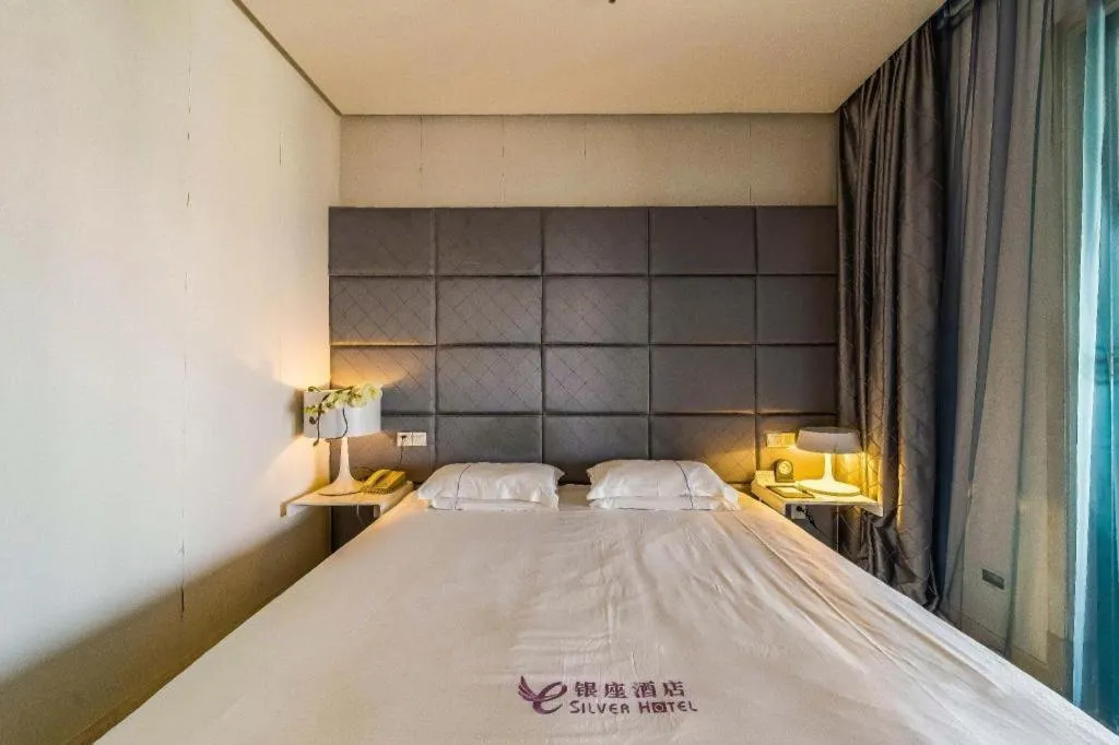 Bed in Silver Art Hotel