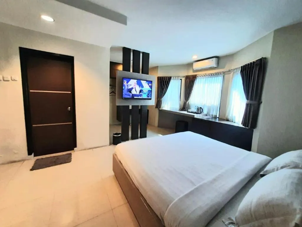 Bed in Alexander Hotel Tegal