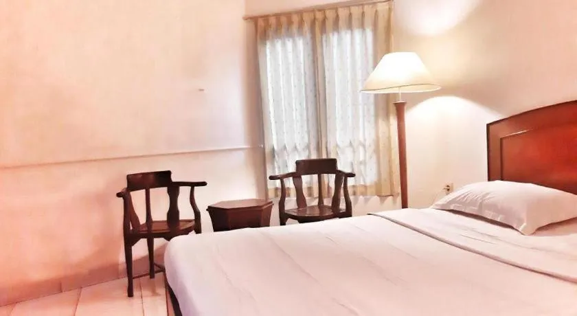 Bed in Alexander Hotel Tegal