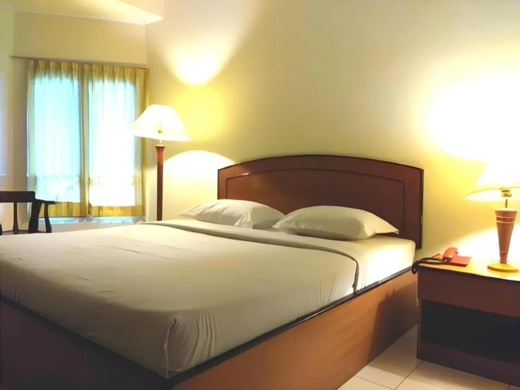Bed in Alexander Hotel Tegal