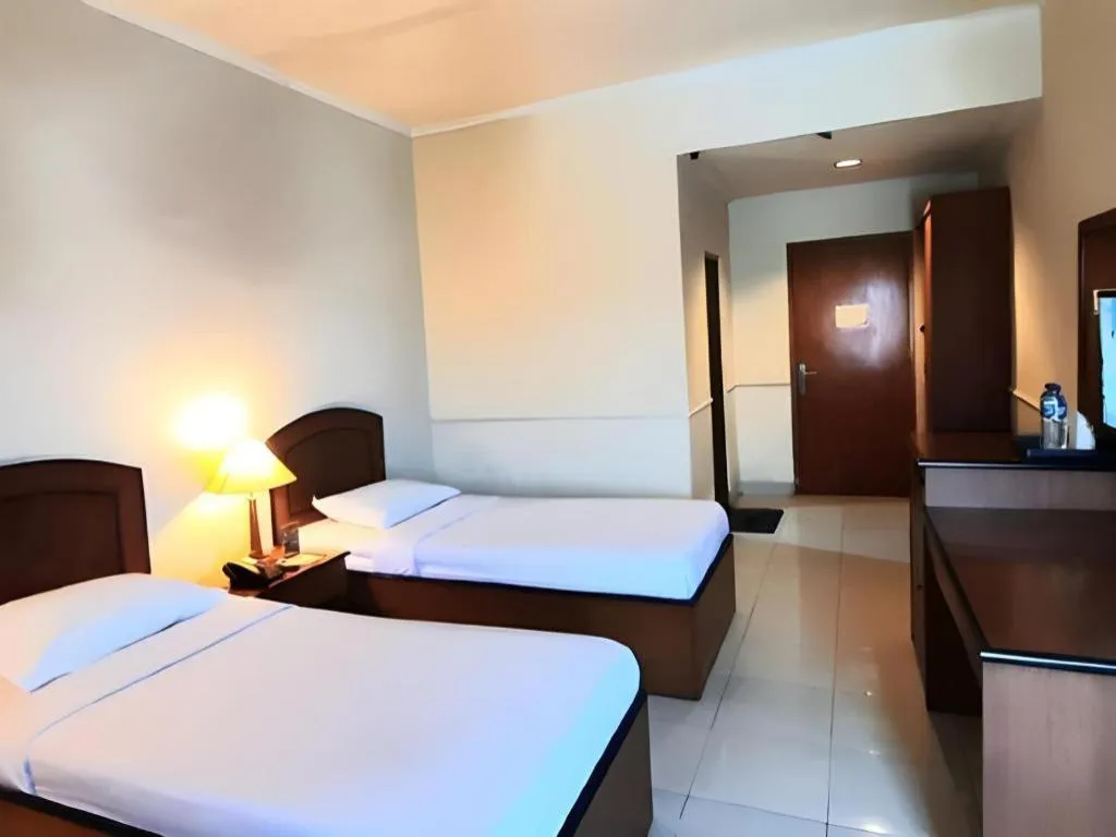 Bed in Alexander Hotel Tegal