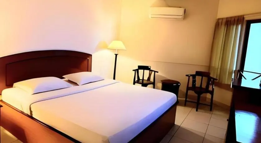 Bed in Alexander Hotel Tegal