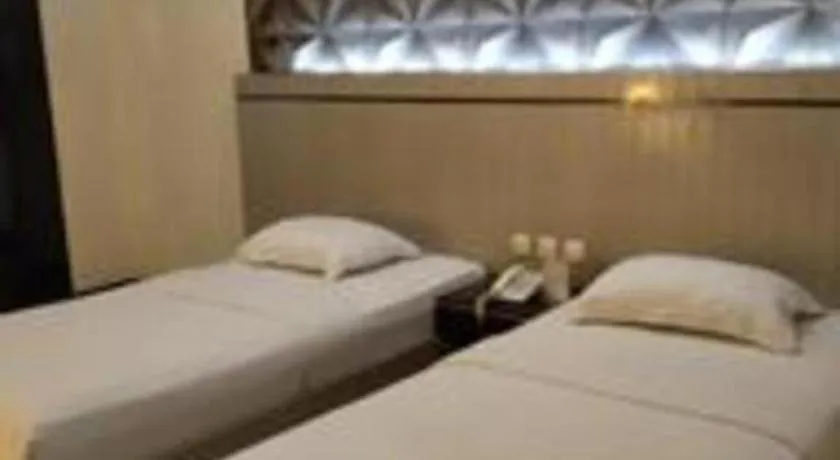 Bed in Alexander Hotel Tegal