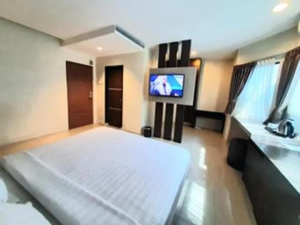 Bed in Alexander Hotel Tegal
