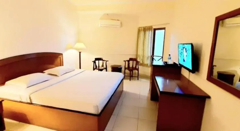 Bed in Alexander Hotel Tegal