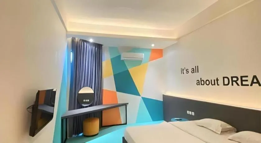 Bed in Alexander Hotel Tegal