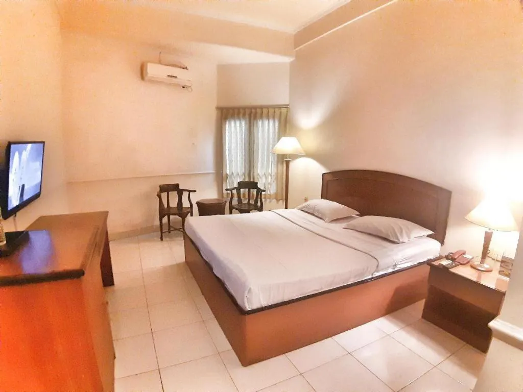 Bed in Alexander Hotel Tegal