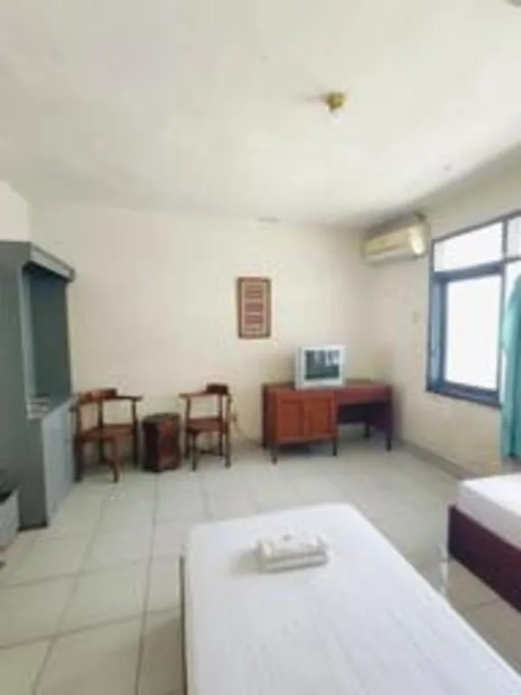 Bed in Alexander Hotel Tegal