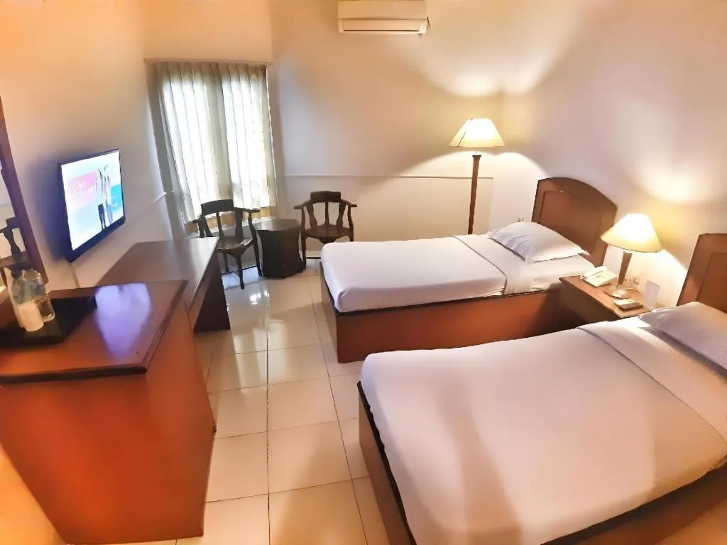 Bed in Alexander Hotel Tegal