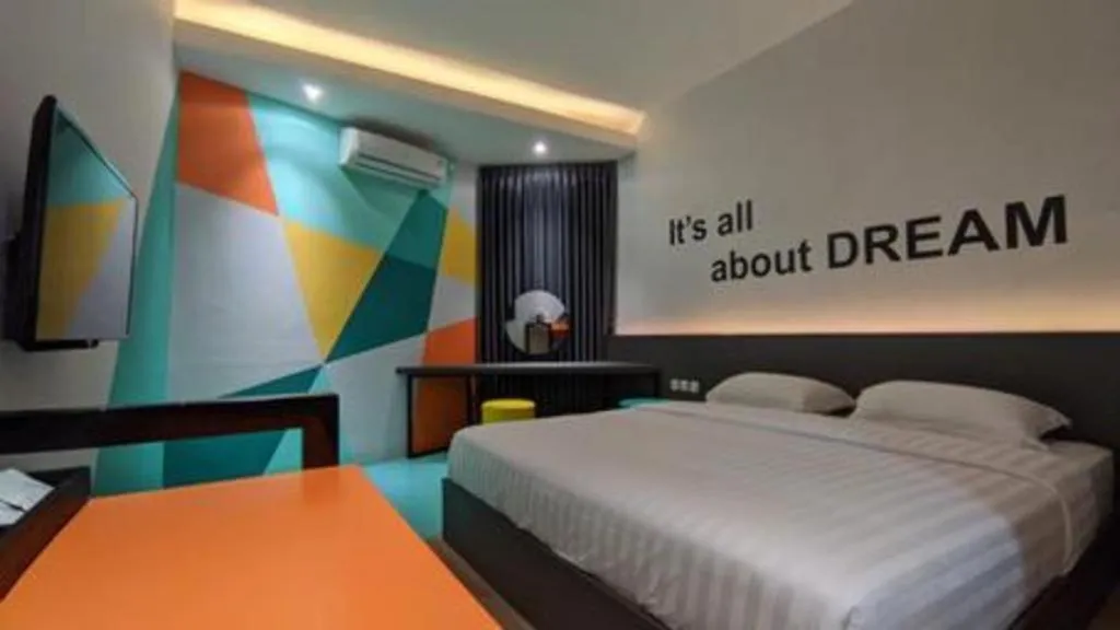 Bed in Alexander Hotel Tegal
