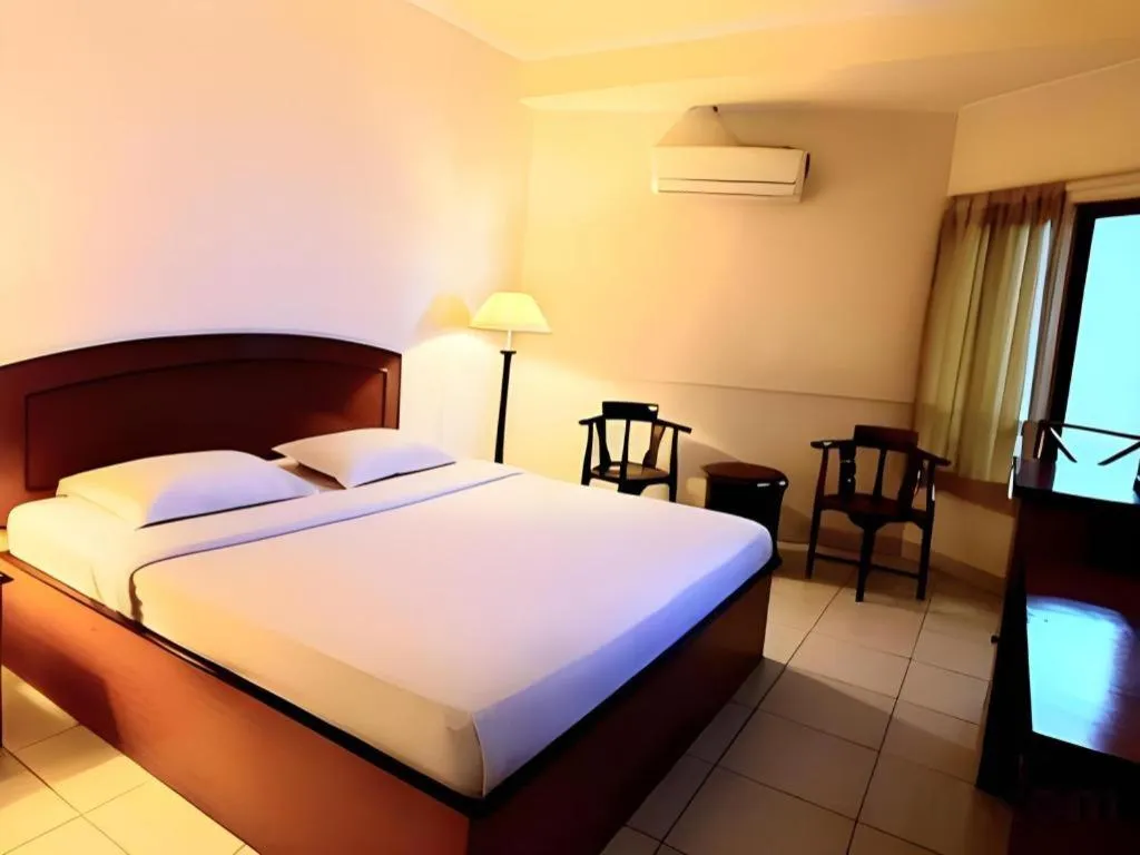 Bed in Alexander Hotel Tegal
