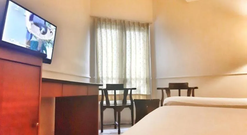 Bed in Alexander Hotel Tegal