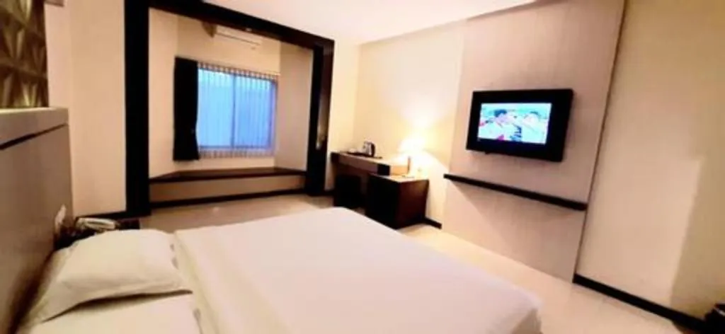 Bed in Alexander Hotel Tegal