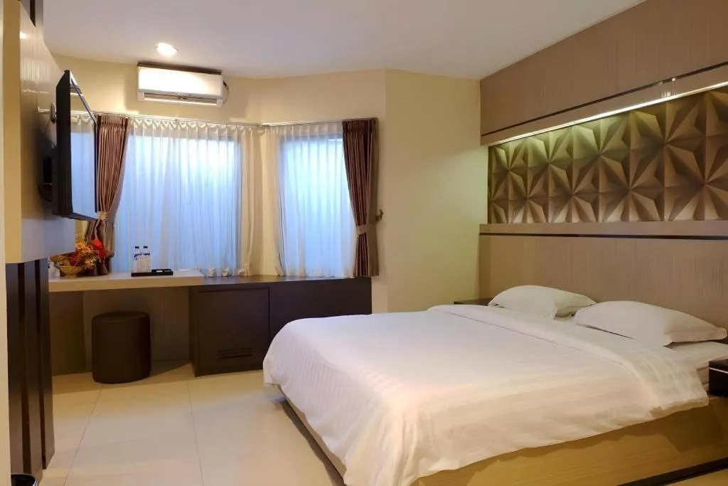 Bed in Alexander Hotel Tegal