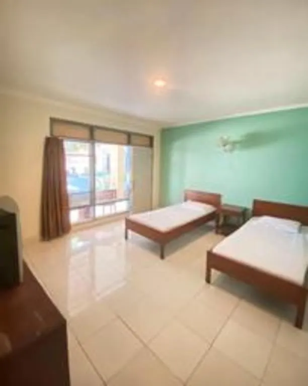 Bed in Alexander Hotel Tegal