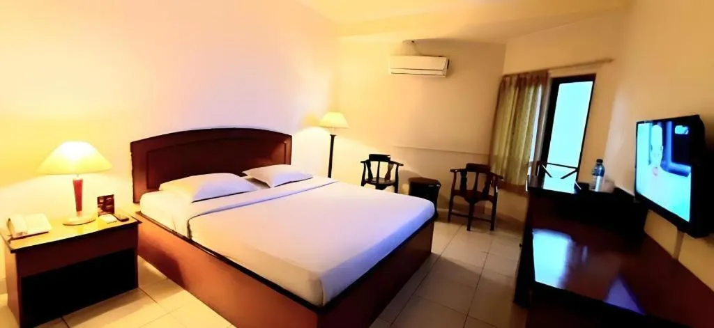 Bed in Alexander Hotel Tegal
