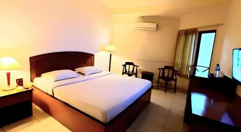 Bed in Alexander Hotel Tegal
