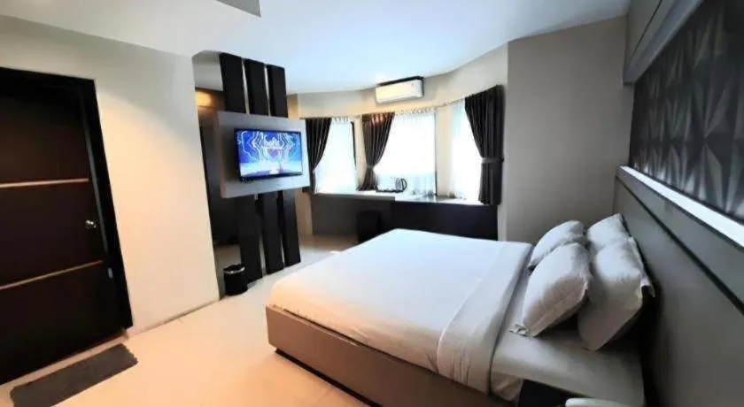Bed in Alexander Hotel Tegal