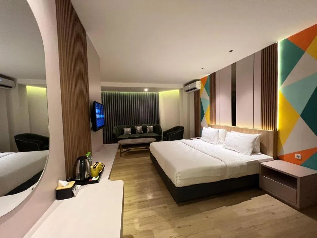 Bed in Alexander Hotel Tegal