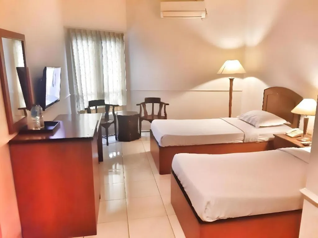 Bed in Alexander Hotel Tegal