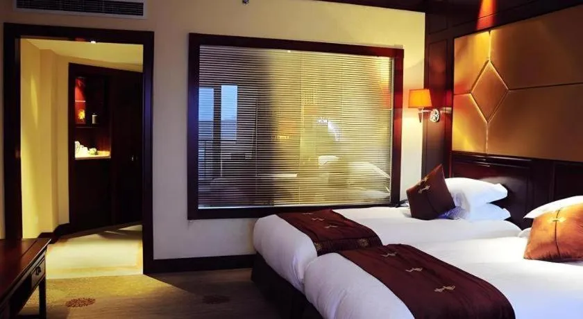 Bed in Hangzhou Blossom Water Museum Hotel