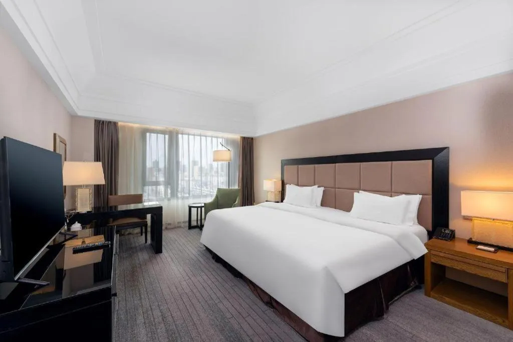 Bed in Shenyang Haiyun Jinjiang International Hotel