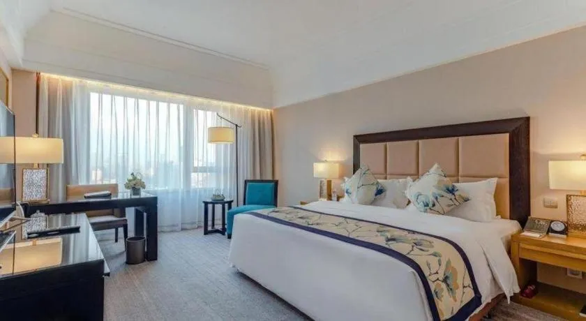 Bed in Shenyang Haiyun Jinjiang International Hotel