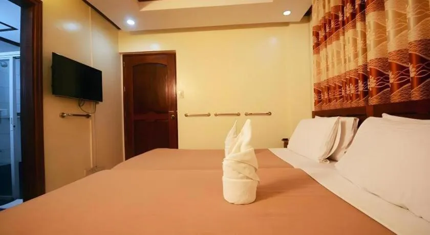 Bed in Ipil Suites El Nido