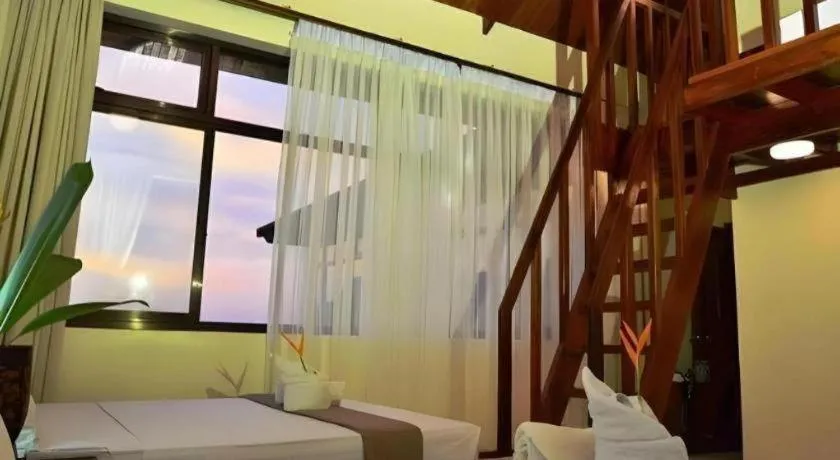 Bed in Ipil Suites El Nido