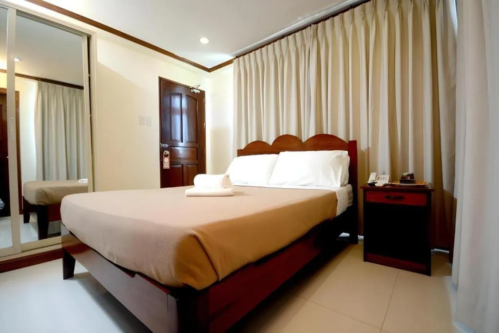 Bed in Ipil Suites El Nido