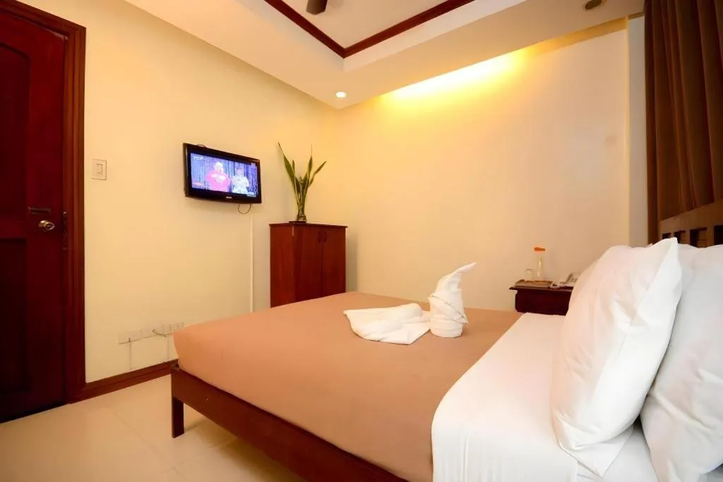 Bed in Ipil Suites El Nido