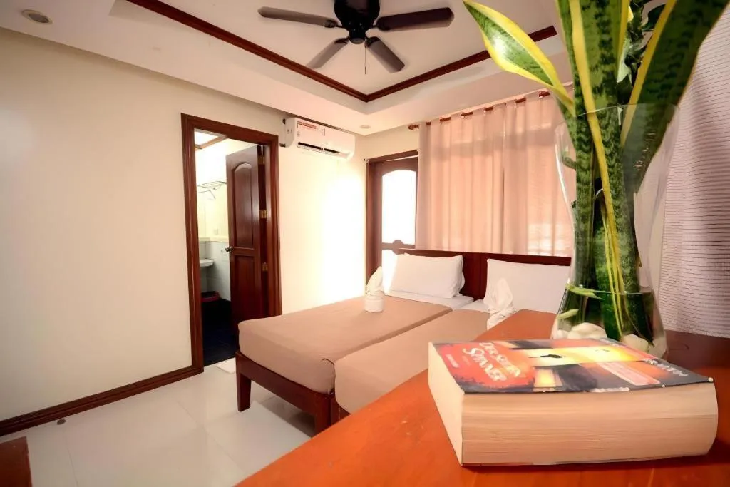 Bed in Ipil Suites El Nido
