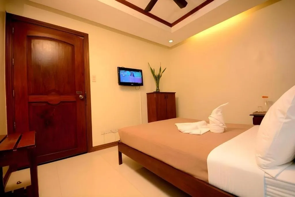 Bed in Ipil Suites El Nido