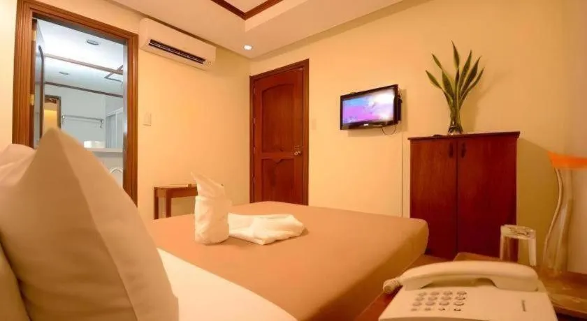 Bed in Ipil Suites El Nido