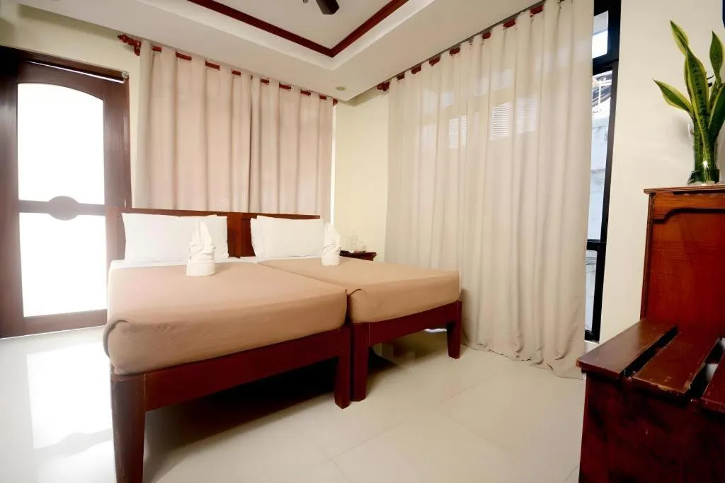 Bed in Ipil Suites El Nido