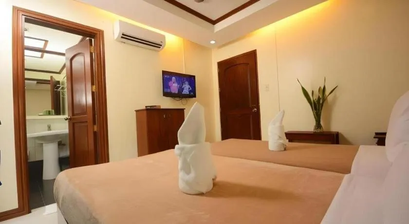 Bed in Ipil Suites El Nido