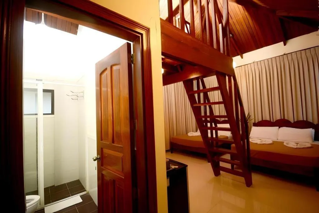 Bed in Ipil Suites El Nido