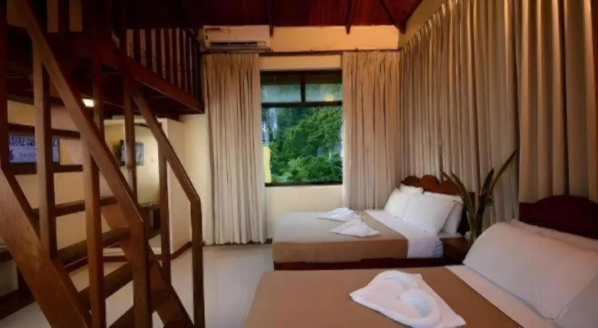 Bed in Ipil Suites El Nido