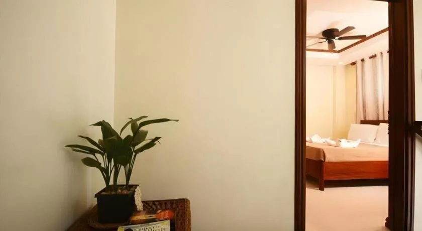 Bed in Ipil Suites El Nido